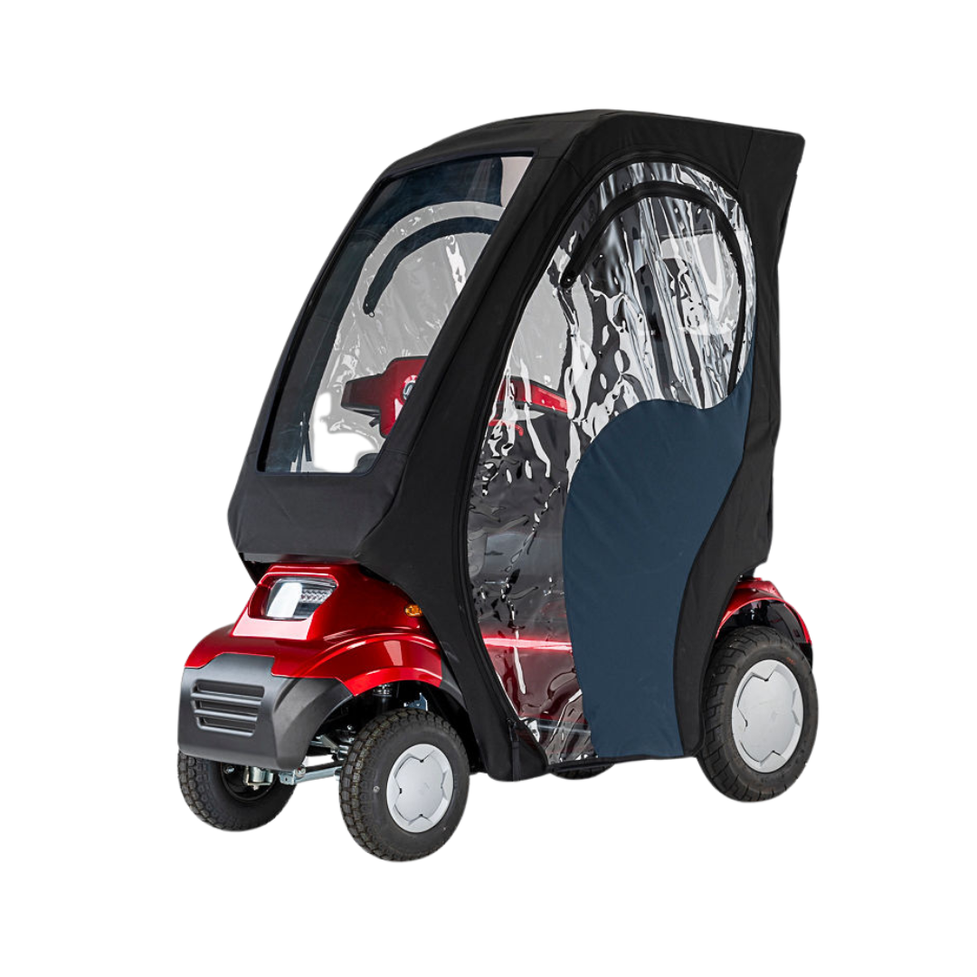 The Afikim Electric Vehicle Accessories’ red mobility scooter offers customization options and features a black and transparent rain cover. With four wheels and a sturdy build, the clear panels provide all-around visibility, enhancing comfort and safety on every journey.